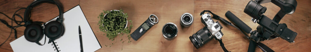 Banner featuring photography eqipment as camera, gimble, lenses blocknote and headphones